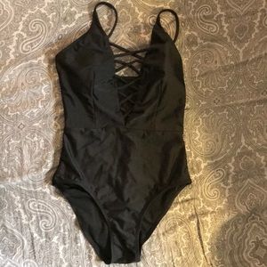 Black one piece bikini with spaghetti straps